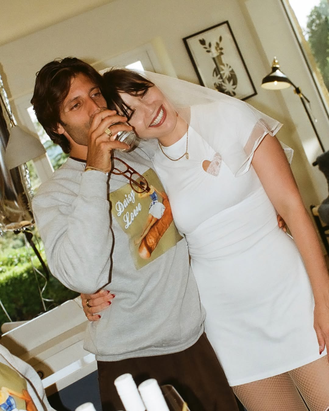 The couple celebrated with close friends and family at an Italian restaurant. (Image by @daisylowe via Instagram)