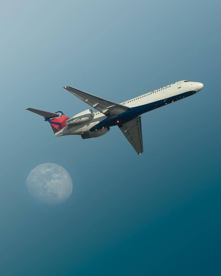 A Delta flight was delayed after a crew member accidentally deployed an emergency slide. (Image by @delta via Instagram)